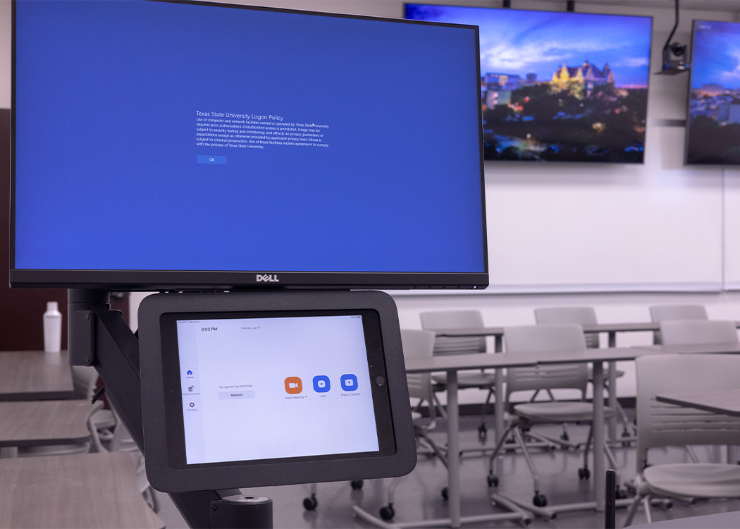 Monitor and touch control panel in a classroom